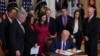 Дональд Трамп подписывает закон имени Лейкен Райли в Белом доме, 29 января 2025 года