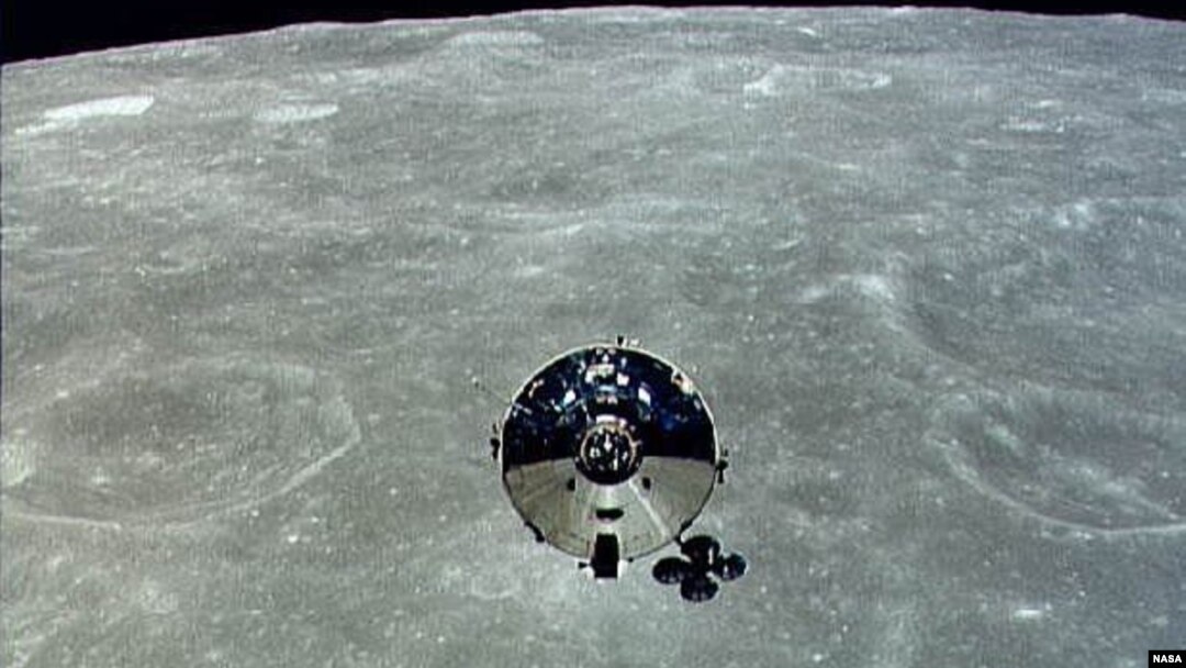 The Apollo 10 command module is seen orbiting the moon during its 1969 mission. 