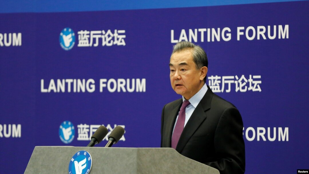 中國國務委員兼外交部長王毅2021年2月22日在一個論壇上談中美關係。（路透社）