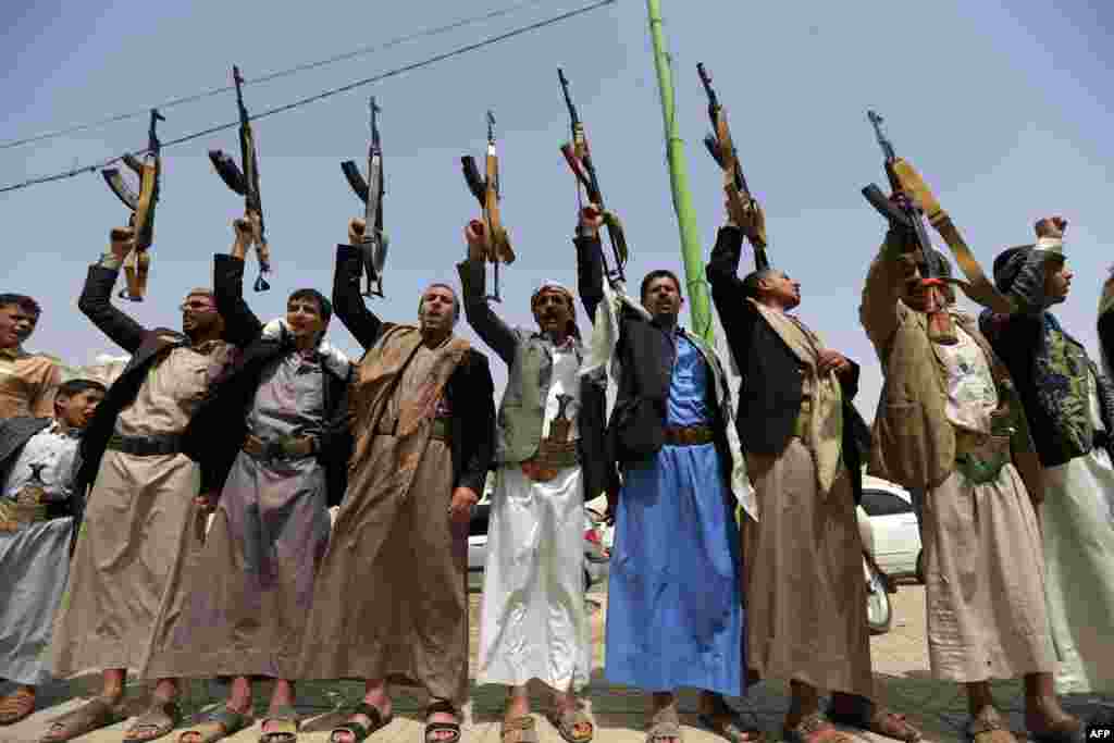 Supporters of the Shi'ite Huthis demonstrate in the capital Sana'a, to show their solidarity with fellow Huthis engaged in battles against the coalition forces led by the UAE and Saudi Arabia in Red Sea port city of Hudeida, Yemen.