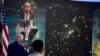 President Joe Biden listens during a briefing from NASA officials about the first images from the Webb Space Telescope, the highest-resolution images of the infrared universe ever captured, in the South Court Auditorium on the White House complex, July 11, 2022.