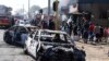 Magari yaliyoteketezwa kwa moto nje kidogo ya mji wa Johannesburg, Jumatatu Sept. 2, 2019. P