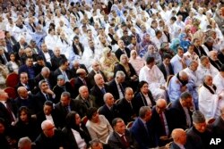 Members of political parties from across the spectrum meet in Laayoune, Western Sahara's largest city, to condemn the latest actions of the Polisario Front, a movement seeking independence for mineral-rich Western Sahara, April 9, 2018.