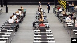Students in Germany have resumed classes under restrictions.