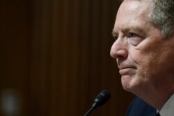 FILE - U.S. Trade Representative Robert Lighthizer testifies before the Senate Finance Committee on Capitol Hill in Washington, June 18, 2019.