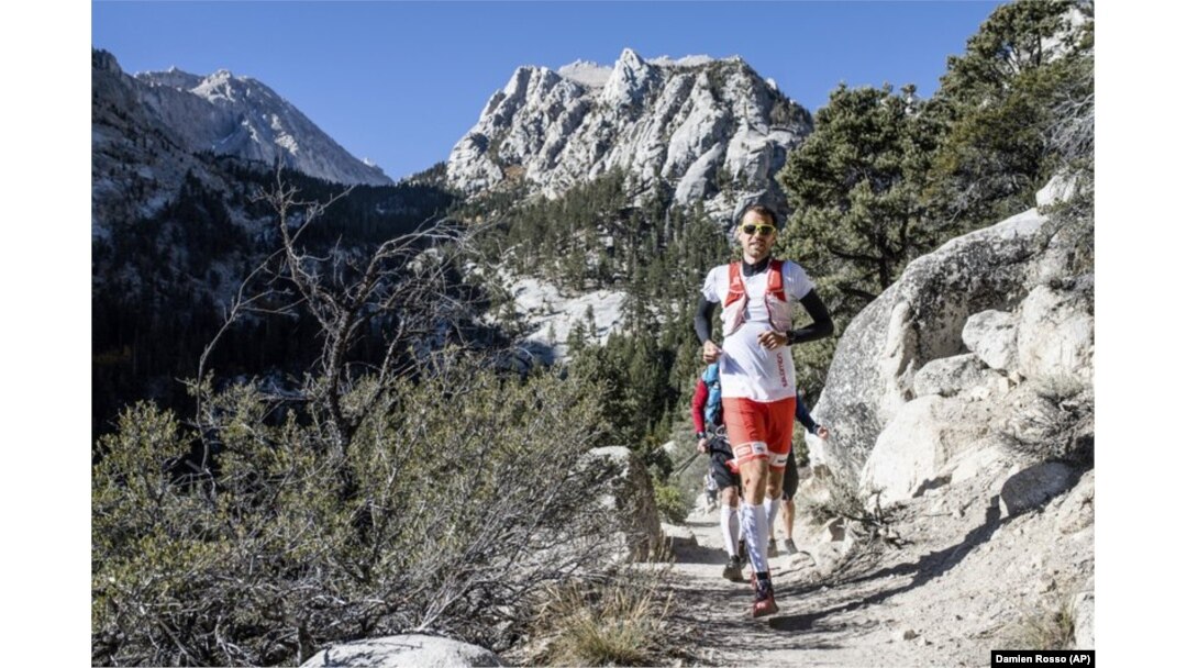 Professional trail runner Francois D’haene running on the John Muir Trail in the California Sierra Nevada mountain range.