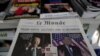 Copies of the French newspaper Le Monde with the headline "Trump-Biden: The United States Is Tearing Itself Apart" is seen at a newspaper stand in Paris, France, Nov. 4, 2020. 
