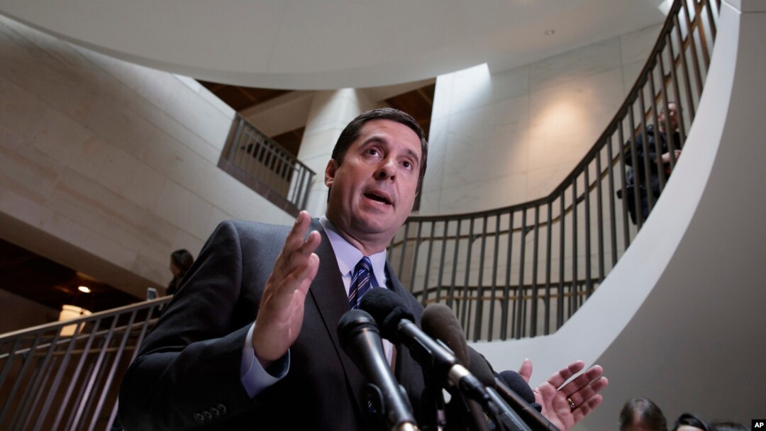 FILE - House Intelligence Committee Chairman Devin Nunes, R-Calif., left, speaks to reporters at the Capitol in Washington, March 24, 2017.