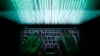 A man types on a computer keyboard in this illustration image. The U.S. State Department has offered a reward of up to $2.5 million for information leading to the arrest of alleged Belarusian cybercriminal Volodymyr Kadariya.