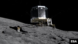 Still image from animation of Philae separating from Rosetta and descending to the surface of comet 67P/Churyumov-Gerasimenko, Nov. 2014.