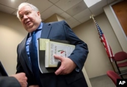 FILE - Russia's ambassador to the U.S. Sergey Kislyak, speaks with reporters in Washington.