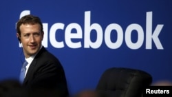 FILE - Facebook CEO Mark Zuckerberg attends a town hall at Facebook's headquarters in Menlo Park, California, Feb. 27, 2015.