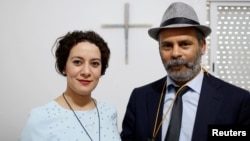 Farah Tarneem and her husband, Adam Rabti, a native Moroccan converted to Christianity, pose in a house used as a church in Ain Atiq district in the outskirts of Rabat, Morocco, June 4, 2018. 