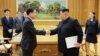 North Korean leader Kim Jong Un greets Chung Eui-yong, head of the presidential National Security Office, in Pyongyang, North Korea, March 6, 2018. 