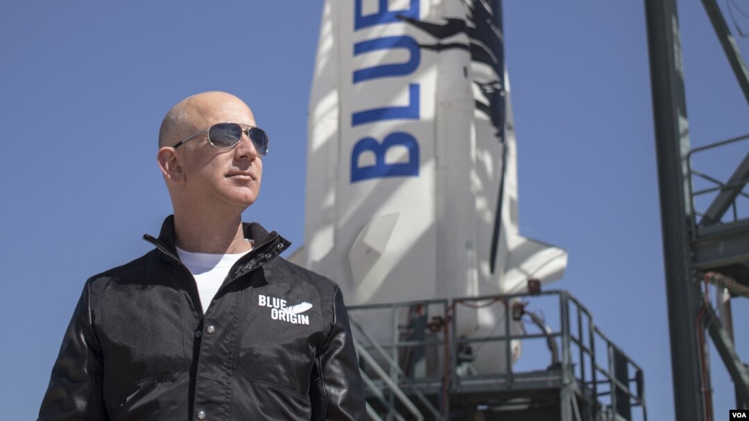 Jeff Bezos, founder of Blue Origin, inspects New Shepard’s West Texas launch facility before the rocket’s maiden voyage. (Blue Origin)