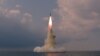 북한 조선중앙통신이 지난 19일 공개한 신형 잠수함발사탄도미사일(SLBM) 시험 발사 장면.