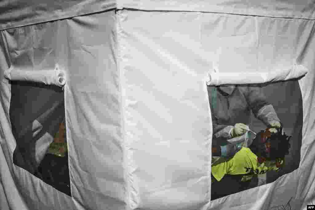 A man is tested for the novel coronavirus, COVID-19, in Vrededorp, Johannesburg.