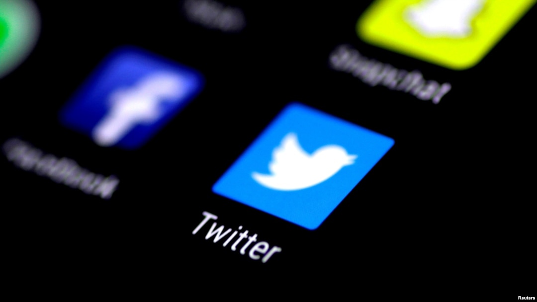 FILE - The Twitter application is seen on a phone screen. 