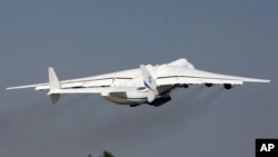 FILE - The world's largest airplane, Ukrainian Antonov An-225 Mriya takes off at the airport at Hostomel near Kyiv, Ukraine, May 10, 2016.