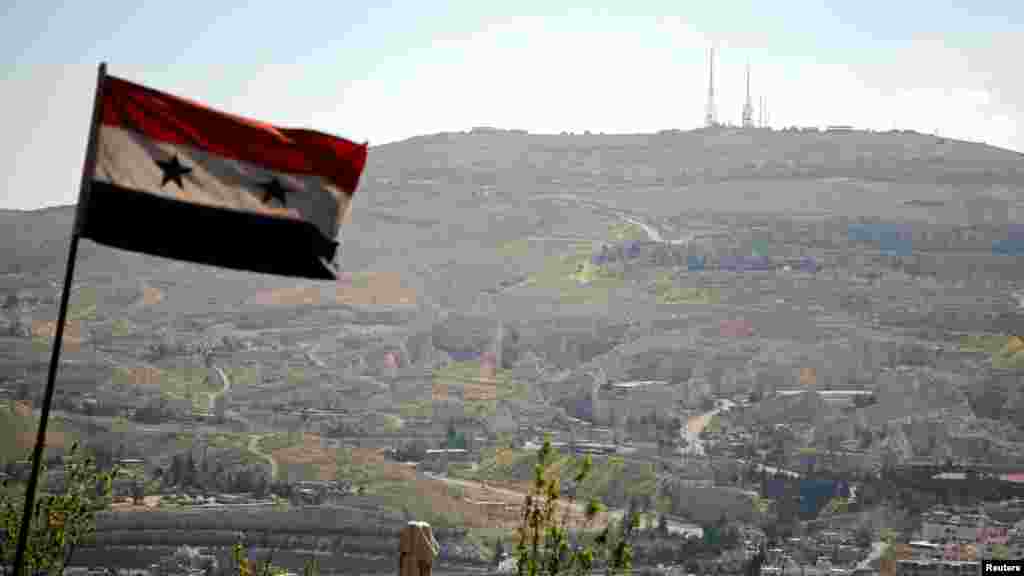 Tutar kasar Syria akan wani dutse dake kusan babban birnin Damascus. Afrilu 7, 2017 