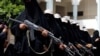 FILE - To show their support for the Houthi movement, women participate in a parade in Sana'a, Yemen, Sept. 7, 2016. Western and Iranian officials note an increase in the flow of arms to the Iran-backed rebels.