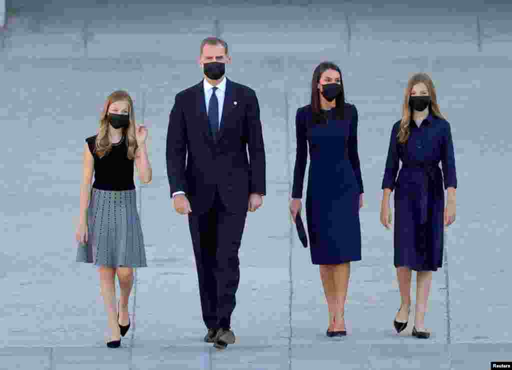 Spain's King Felipe, Queen Letizia, Princess Leonor and Infanta Sofia arrive to a state tribute in memory of Spain's COVID-19 victims at Royal Palace in Madrid.