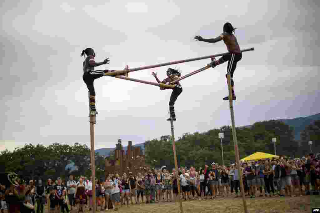 Togolese stilt walker group "Afuma" performs during the 41st edition of Paleo in Nyon, the biggest open-air music festival in Switzerland, July 20, 2016.