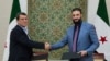 На этой фотографии, опубликованной сирийским агентством SANA, временный президент Сирии Ахмед аль-Шараа (справа) пожимает руку Мазлуму Абди, командующему поддерживаемыми США возглавляемыми курдами Сирийскими демократическими силами, в Дамаске, Сирия, 10 марта 2025 года.