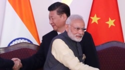 སྲིད་བློན་མོ་དྷིས་རྒྱ་ནག་གི་ཚུར་རྒོལ་བྱུང་ན་རྒོལ་ལན་སློག་རྒྱུ་ཡིན་ཟེར།