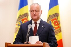 Incumbent Moldovan President Igor Dodon speaks to media in Chisinau, Moldova, Nov. 16, 2020.