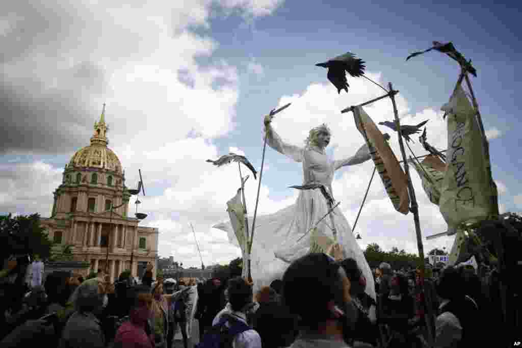 A giant puppet is paraded during a demonstration of hospitals workers, in Paris, France.