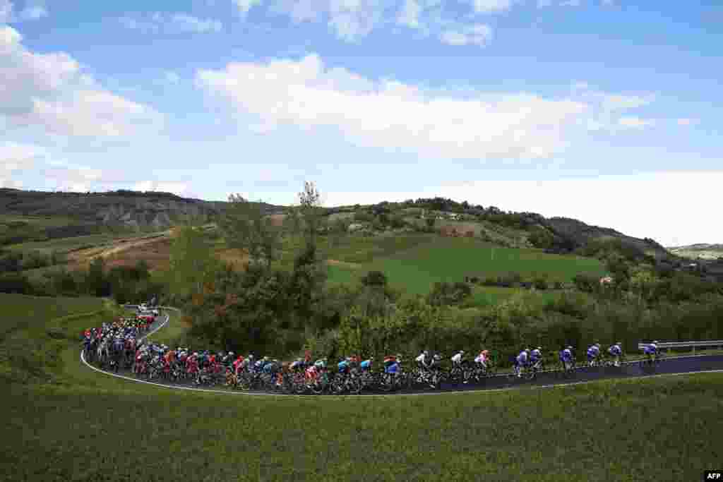 The pack rides during the 12th stage of the Giro d'Italia 2020 cycling race, a 204-kilometer route between Cesenatico and Cesenatico, Italy.