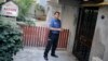 A Turkish police officer stands outside the house of American Pastor Andrew Craig Brunson, a 50-year-old evangelical pastor from Black Mountain, North Carolina, before his arrival, in Izmir, Turkey, July 25, 2018 after his release from a jail near Izmir. 