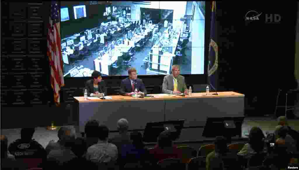 Rachel Kraft, NASA spokewoman, Frank Culbertson, Executive Vice President and General Manager of Advanced Programs Group at Orbital Sciences Corp., and Bill Wrobel, director of NASA's Wallops Flight Facility, speak at a news conference in this still image from NASA TV at Wallops Flight Facility, Virginia, Oct. 28, 2014.