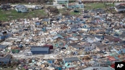 Vista de la destrucción dejada por el huracán Dorian en Marsh Harbour, en la isla Gran Ábaco, en las Bahamas. Sep. 4 de 2019. Foto Al Díaz/Miami Herald via AP.