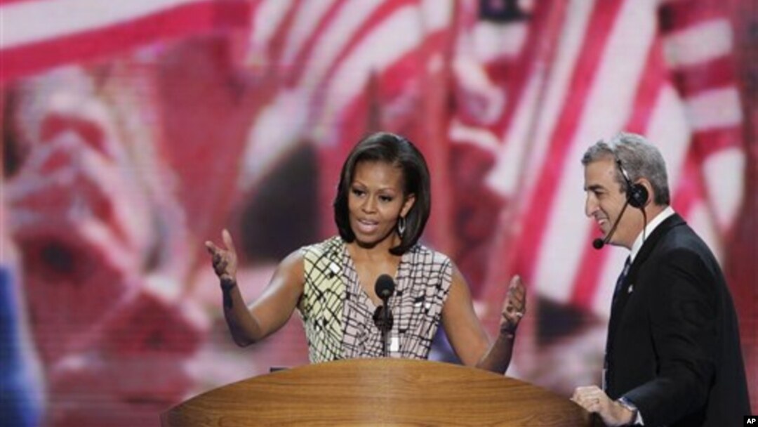 First lady Michelle Obama looks over the podium during a sound check at the Democratic National Convention in Charlotte, North Carolina, September 3, 2012.