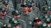 In this Feb. 11, 2019 file photo, Iranian Revolutionary Guard members attend a ceremony celebrating the 40th anniversary of the Islamic Revolution, at the Azadi, or Freedom, Square in Tehran, Iran.