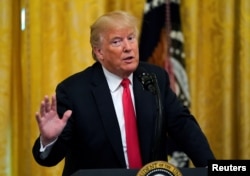 U.S. President Donald Trump hosts an event honoring those working for Immigration and Customs Enforcement and Customs Border Protection at the White House in Washington, Aug. 20, 2018.