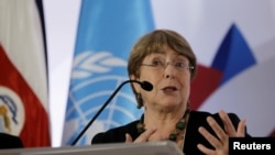 FILE - U.N. High Commissioner for Human Rights Michelle Bachelet gives a speach during a forum on women of African descent in San Jose Dec. 3, 2019. 