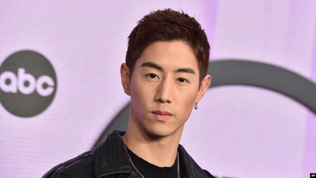 FILE - K-pop musician Mark Tuan arrives at the American Music Awards in Los Angeles on Nov. 20, 2022. (Photo by Jordan Strauss/Invision/AP, File)