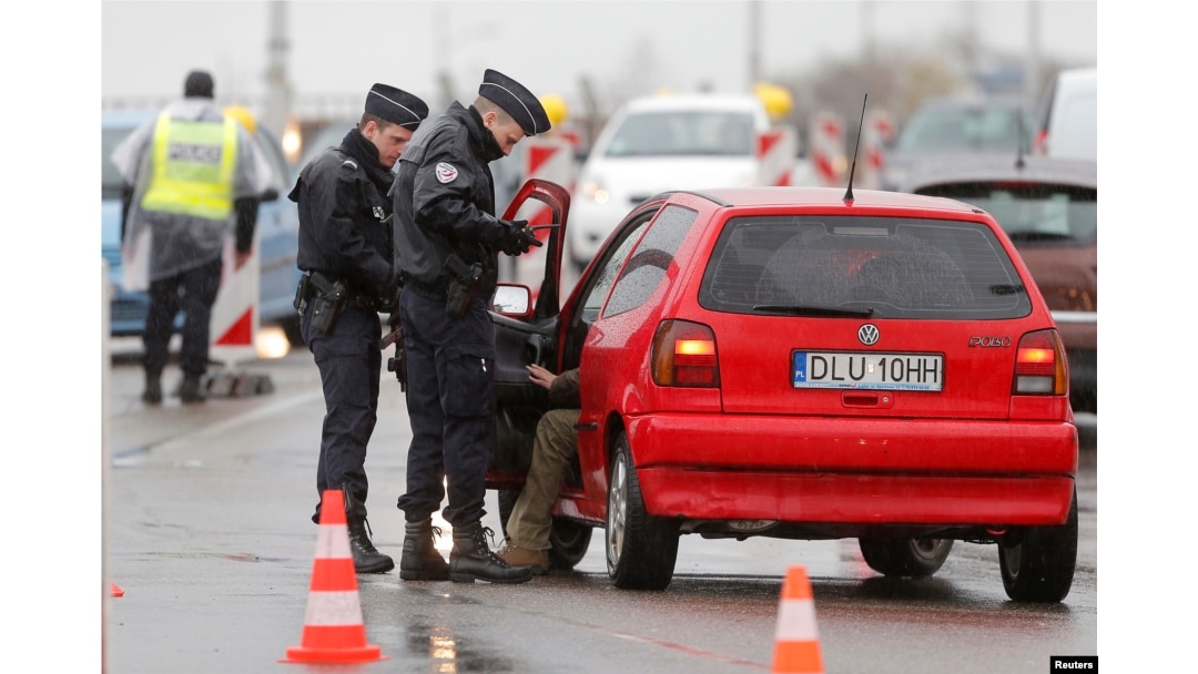 French police conduct a control at the French-German border in Strasbourg, France, to check vehicles and verify the identity of travelers as security increases after last Friday's deadly attacks in Paris, Nov. 20, 2015.