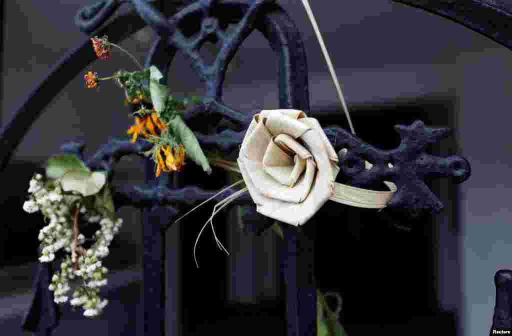 A palmetto rose is tied to the entrance way at Emanuel African Methodist Episcopal Church in Charleston, South Carolina, June 15, 2016. Friday marks the one-year anniversary of the shooting of nine people, including senior pastor Rev. Clementa Pinckney, during a prayer service at the church.