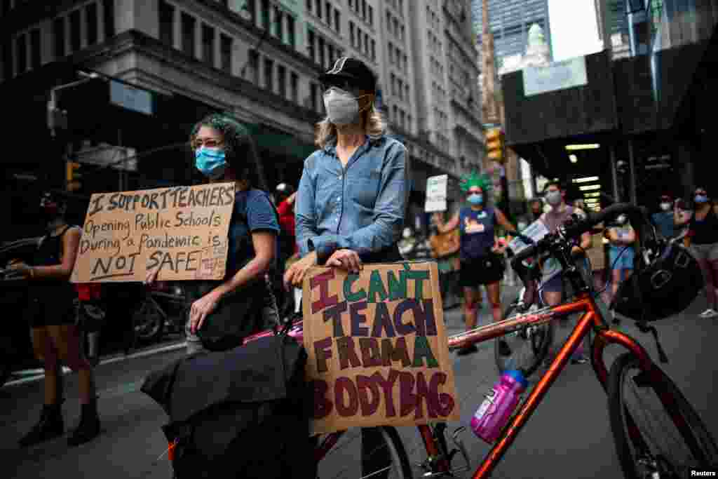 People take part in a march during the National Day of Resistance to schools re-opening amid the outbreak of the coronavirus disease (COVID-19), in New York City, Aug. 3, 2020.
