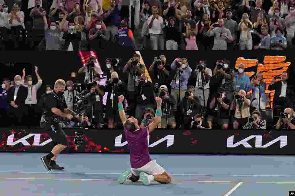 Rafael Nadal of Spain celebrates after defeating Daniil Medvedev of Russia during the men's singles final at the Australian Open tennis championships in Melbourne, Australia, Jan. 31, 2022.