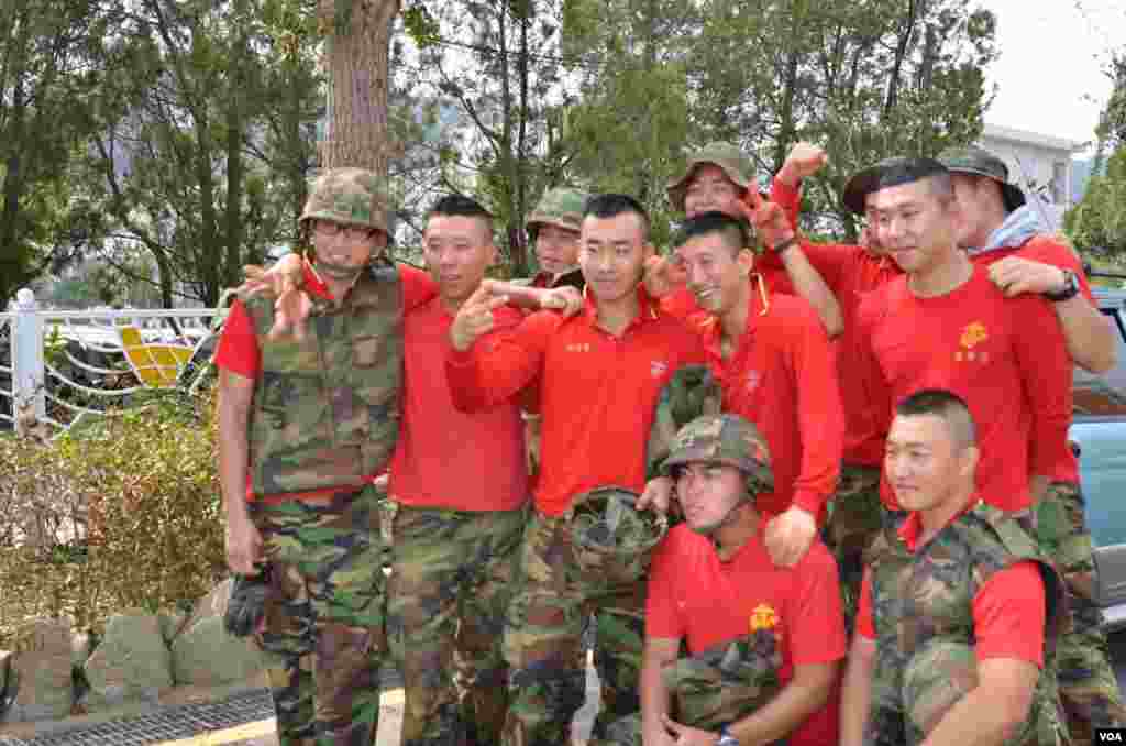 South Korean marines posted on Yeonpyeong pose for a group photograph. (Photo: VOA / Steve Herman)