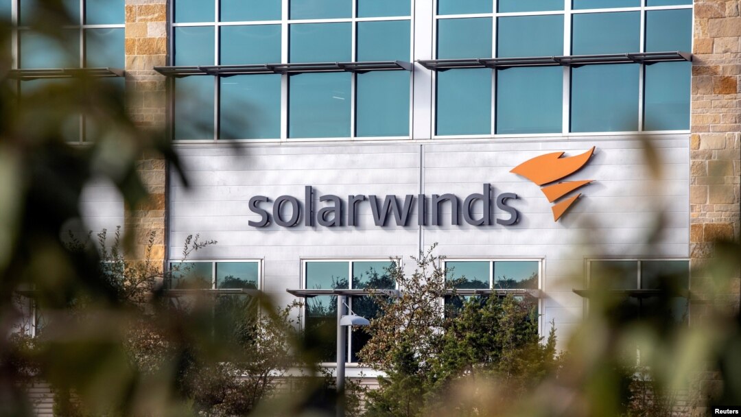 FILE - The SolarWinds logo is seen outside its headquarters in Austin, Texas, Dec. 18, 2020. 