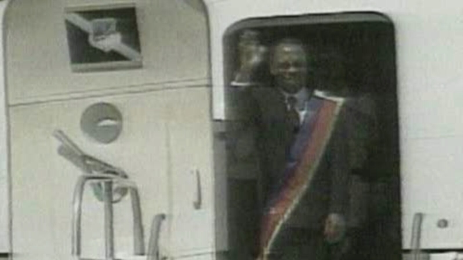 Jean-Bertrand Aristide returning to Haiti in 1994 after being ousted from power