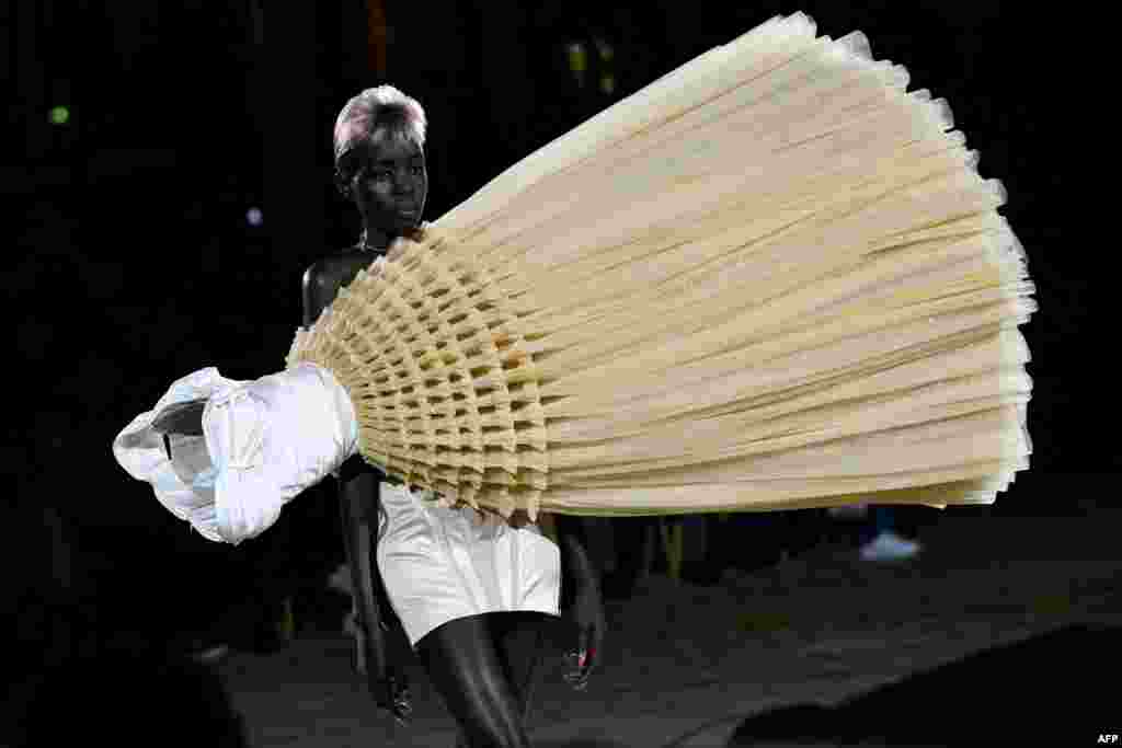 A model presents a creation for Viktor &amp; Rolf during the Haute-Couture Spring-Summer 2023 Fashion Week in Paris, France.