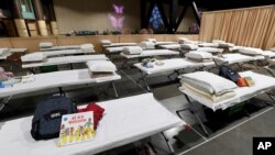 Interior del centro de convenciones de Long Beach, en California, convertido en centro de acogida para migrantes menores de edad, el 22 de abril de 2021.