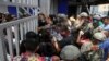Soldiers control the access to the Gamarra textile market after Peru's government deployed military personnel to block major roads, as the country rolled out a 15-day state of emergency to slow the spread of coronavirus disease (COVID-19), in Lima,…